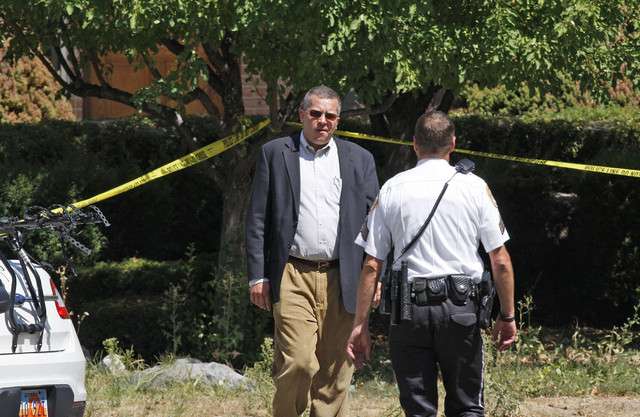 Prosecutor Craig Johnson outside the home of Dr. Joseph Berg, who was found dead along with an unidentified woman, Monday, Aug. 27, 2012, in Orem. (Photo: Tom Smart, Deseret News)