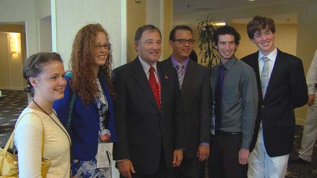 Utah teens from the Junior States of America organization pose for a picture with Utah Gov. Gary Herbert at the Republican National Convention in Tampa, Fla., Aug. 29, 2012.