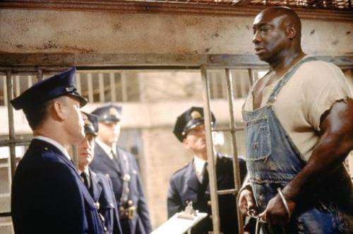 Michael Clarke Duncan and Tom Hanks in "The Green Mile"