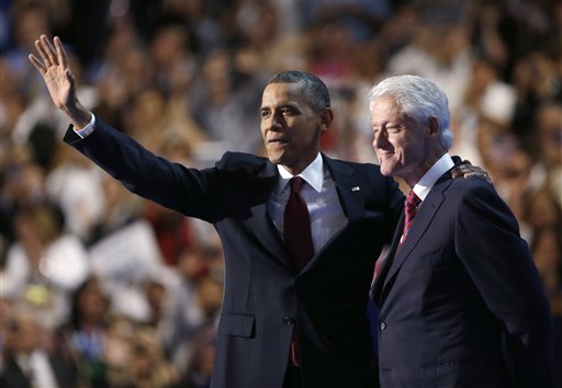 President Barack Obama waves after Former President Bill Clinton spoke at the Democratic National Convention in Charlotte, N.C. Barack Obama could not have asked for a more potent testimonial than Bill Clinton's point-by-point defense of his policies -- destined to play out in campaign ad snippets from now until Election Day. Yet in the end, people vote for candidates, not their surrogates. (AP Photo/David Goldman, File)