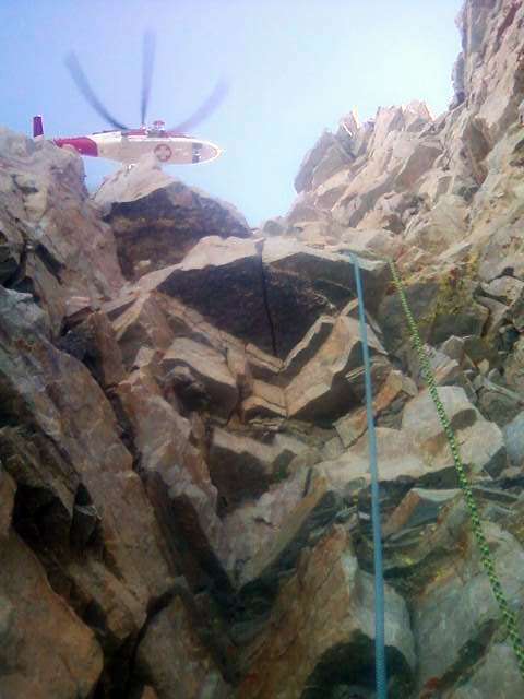 Photo taken by Kevin Curtis shows his perspective as crews were getting ready to hoist him and Tim Meyers onto another perch, where a medical helicopter could reach them.