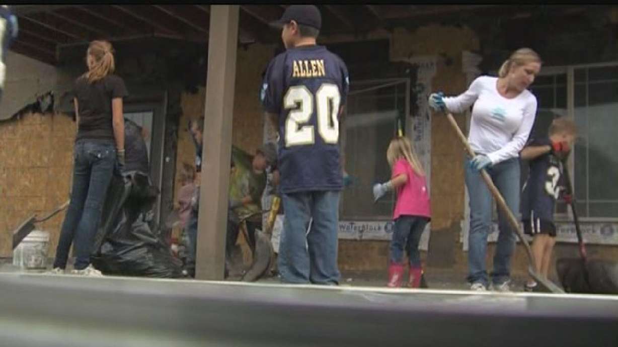 Football players rally around teammate as bad weather rolls in