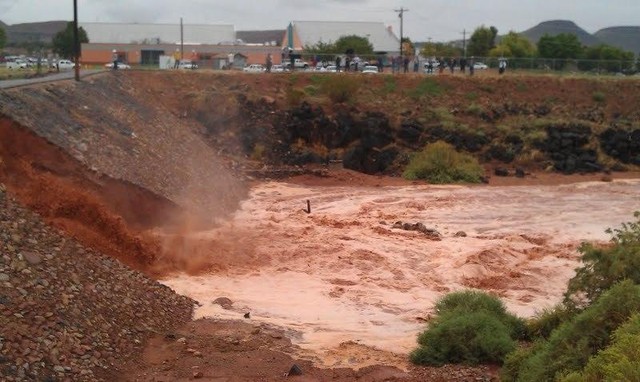 A dike break near Snow Canyon Middle School caused flooding in southern Utah Tuesday, Sept. 11, 2011. (Photo: Lacie Tinker)
