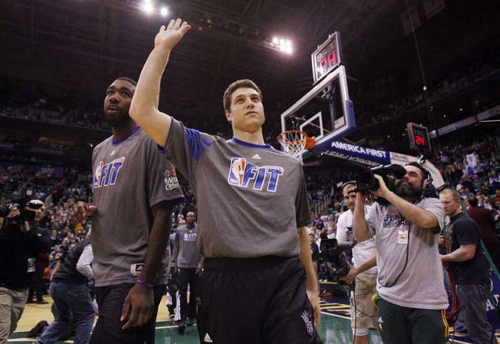 Jimmer Fredette of Sacramento is greeted as he is introduced before the Sacramento Kings face the Utah Jazz. (Ravell Call/Deseret News)