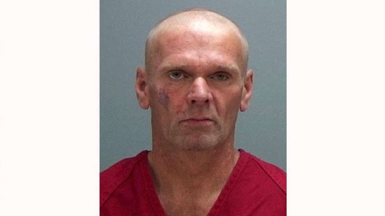 Man with knife at FBI building chose hostage at random, police say