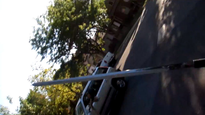 In a recorded altercation with some local residents, David Baker appears to be wielding a sword.