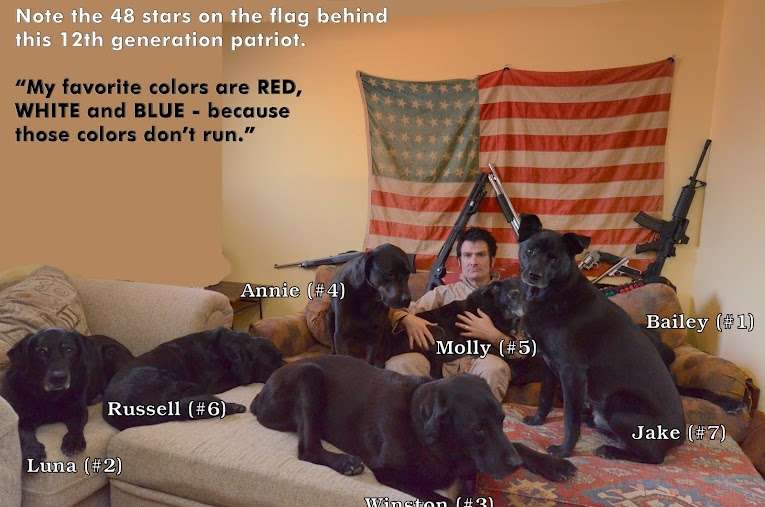 Proctor here sits in front of several weapons including a shotgun, semi-automatic rifle and handguns with his dogs, as well as a flag with only 48 stars on it.