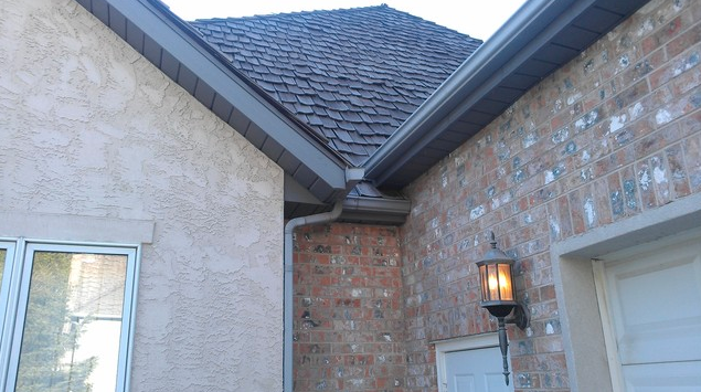 Ice dams above your ceiling, cursing beneath