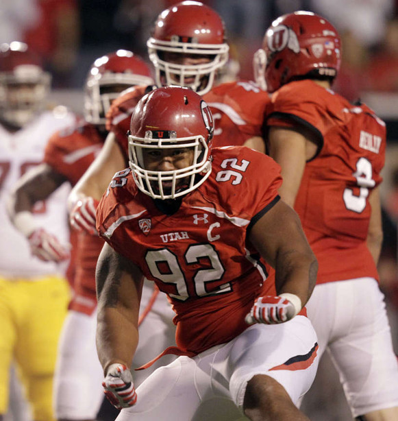 Utah Utes defensive tackle Star Lotulelei celebrates a tackle for loss against USC during Pac-12 football in Salt Lake City, Thursday, Oct. 4, 2012.