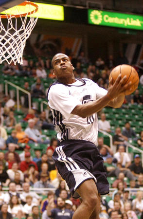 Alec Burks dunks the ball during the Utah Jazz scrimmage at the Energy Solutions Arena in Salt Lake City on Saturday, Oct. 6, 2012. (Kristin Murphy, Deseret News)