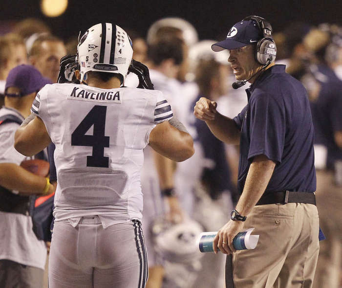 BYU Head coach Bronco Mendenhall talks with Uona Kaveinga against Boise St. (Ravell Call/Deseret News)