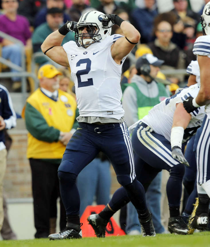 BYU's Spencer Hadley celebrates a 3rd down stop against Notre Dame (Scott G Winterton, Deseret News)