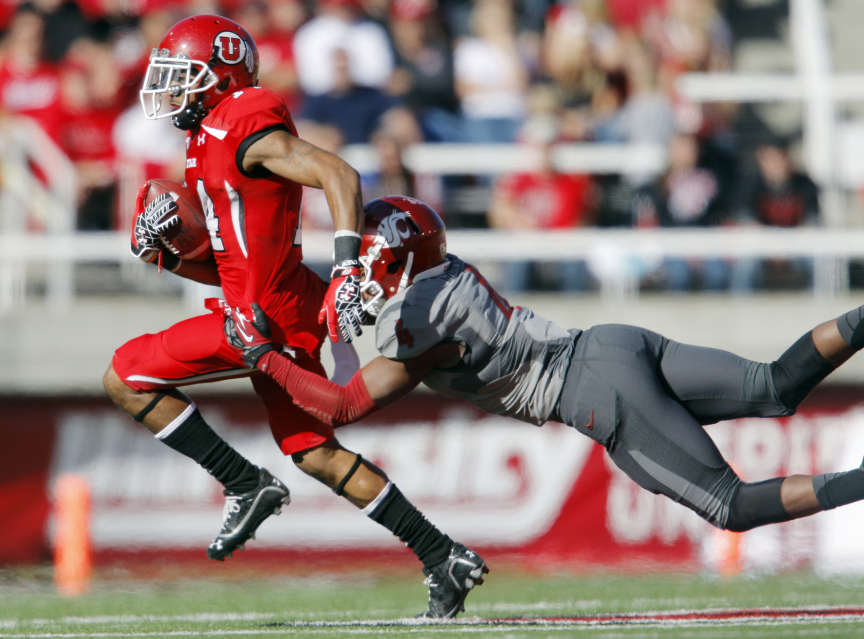 Utah's Reggie Dunn tries to get away from Washington State's #4 Anthony Carpenter (Scott G Winterton, Deseret News)
