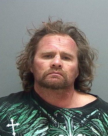 Man attacked officer with knife during drug investigation, police say