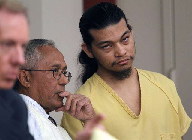 Esar Met, accused of killing 7-year-old Hser Ner Moo in 2008, listens to witness testimony through his interpreter in Judge William Barrett's District Court in Salt Lake City Thursday November 8, 2012, during a preliminary hearing.