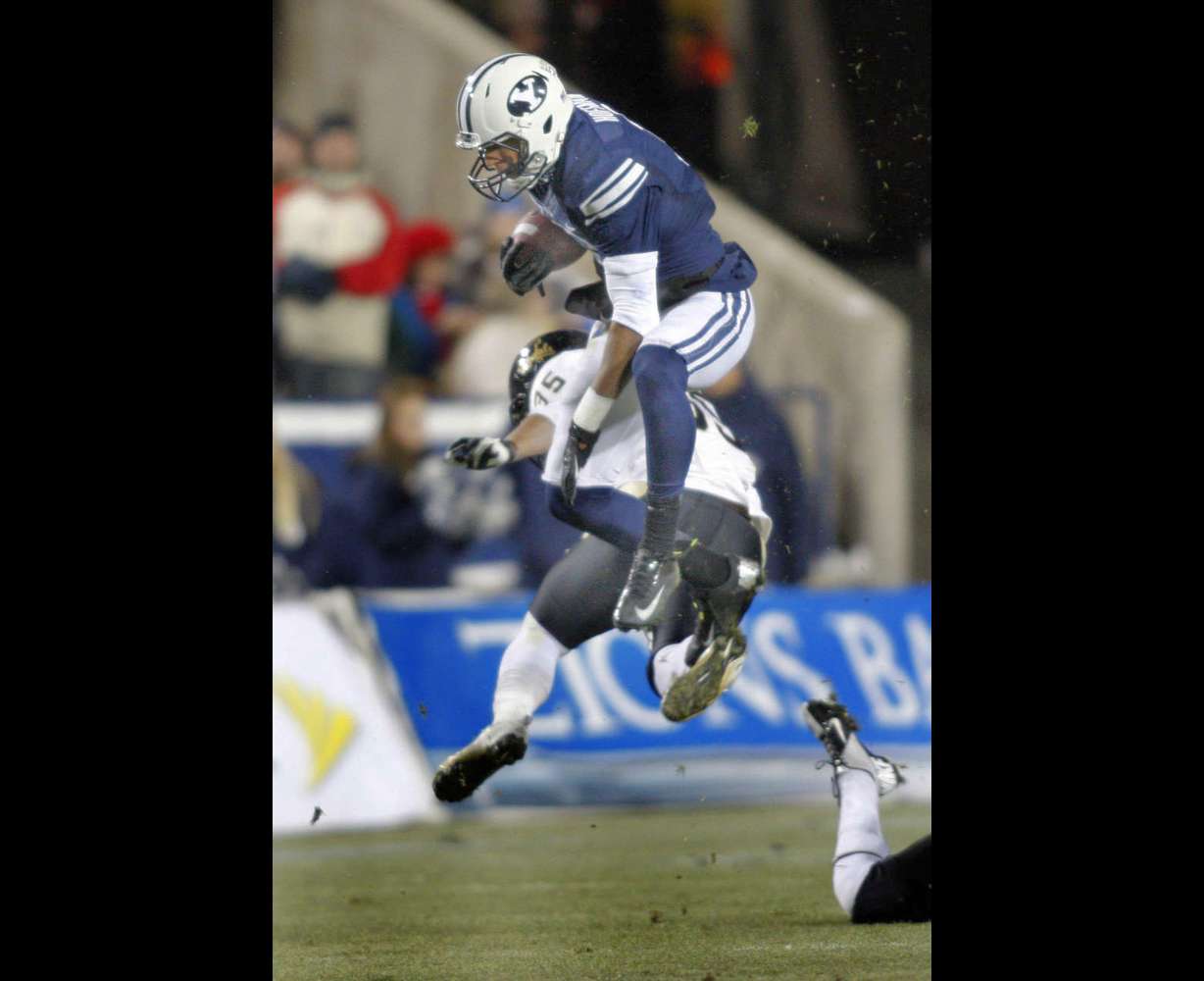 Brigham Young Cougars wide receiver Cody Hoffman (2) jumps over Idaho Vandals linebacker Sua Tuala (35) as BYU plays Idaho in the Cougar's final home football game on 2012 Saturday, Nov. 10, 2012,in Provo, Utah. (Submission date: 11/10/2012)