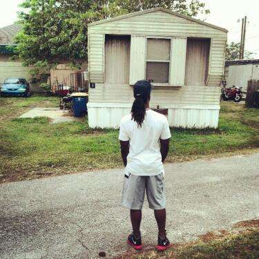 Andrew McCutchen from his twitter account @theCUTCH22 standing in front of the house he grew up in.