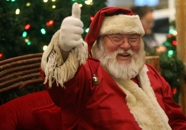 Santa gives a thumbs up at the Valley Fair Mall in West Valley City on Saturday, Nov. 24, 2012. (Photo: Kristin Murphy, Deseret News)