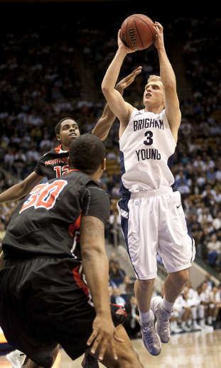 BYU guard Tyler Haws (3) pulls up for a jump shot during the first half of the NCAA basketball game between BYU and Cal State Northridge (Ben Brewer, Deseret News)