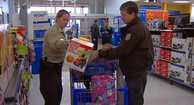 Needy families picked out presents in the 'Shop with a Cop' program