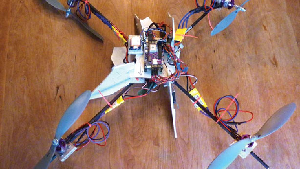Dad builds drone to escort son to bus stop