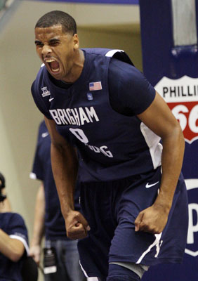 BYU's Brandon Davies reacts after a big play during their 61-58 victory over the Utes in the Marriott Center.