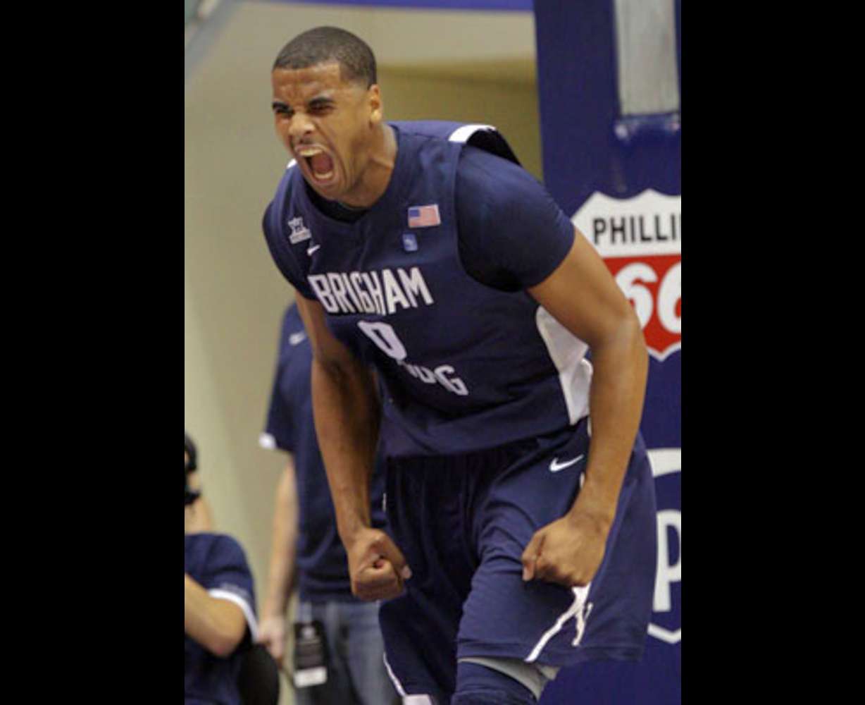 BYU's Brandon Davies reacts after a big play during their 61-58 victory over the Utes in the Marriott Center.
