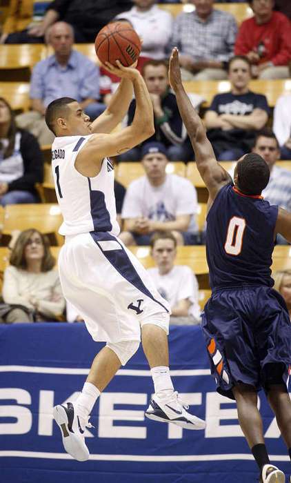 BYU's Raul Delgado puts up a shot over UTSA's A.J. Price. BYU won 81-62. (Scott G. Winterton/Deseret News)