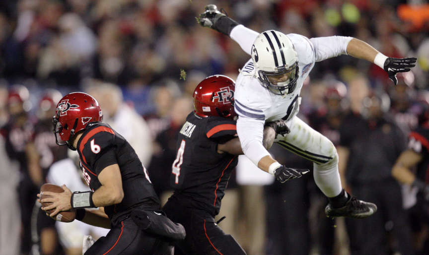 Brigham Young Cougars linebacker Kyle Van Noy (3) flies for San Diego State Aztecs quarterback Adam Dingwell (6) (Jeffrey D. Allred, Deseret News)