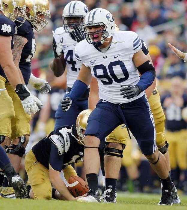 BYU's Bronson Kaufusi celebrates after sacking Notre Dame's Quarterback Tommy Rees. (Scott G. Winterton/Deseret News)