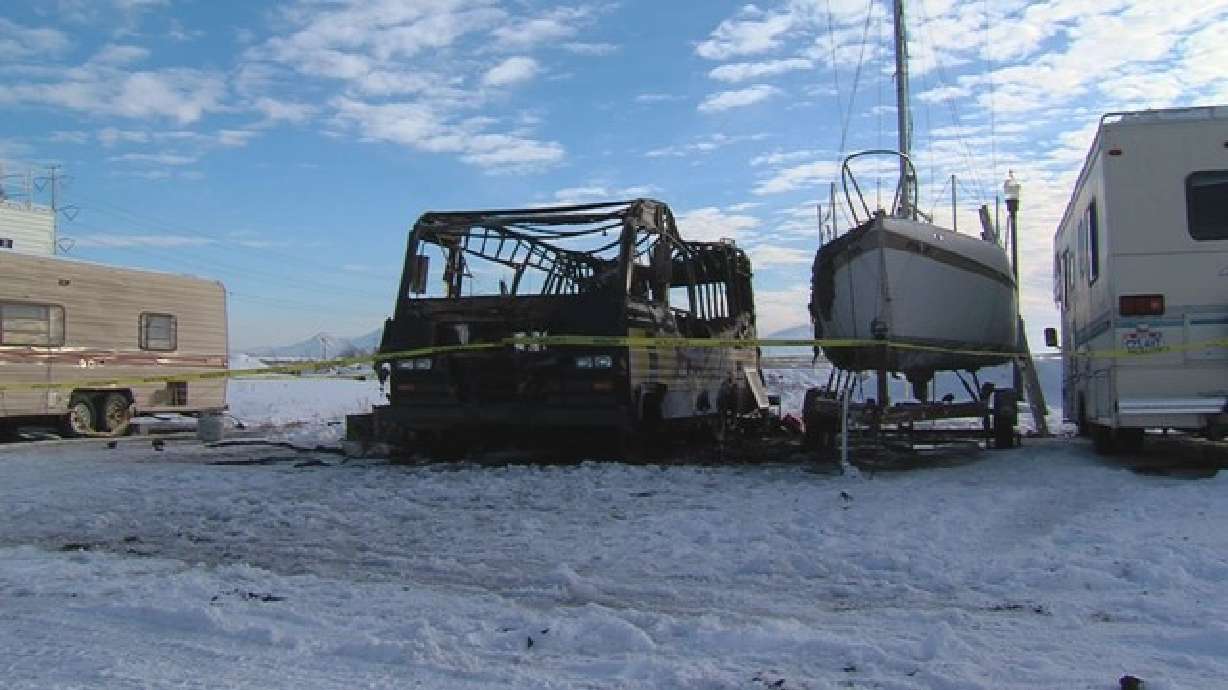 Fire destroys RV; damages trailer and boat at harbor