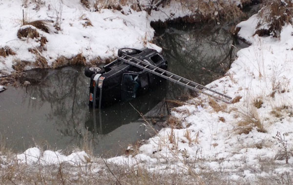 2 SUVs crash; 1 into Jordan River