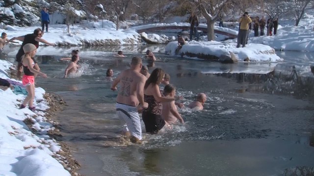 Annual polar bear plunge chills Springville residents old and young