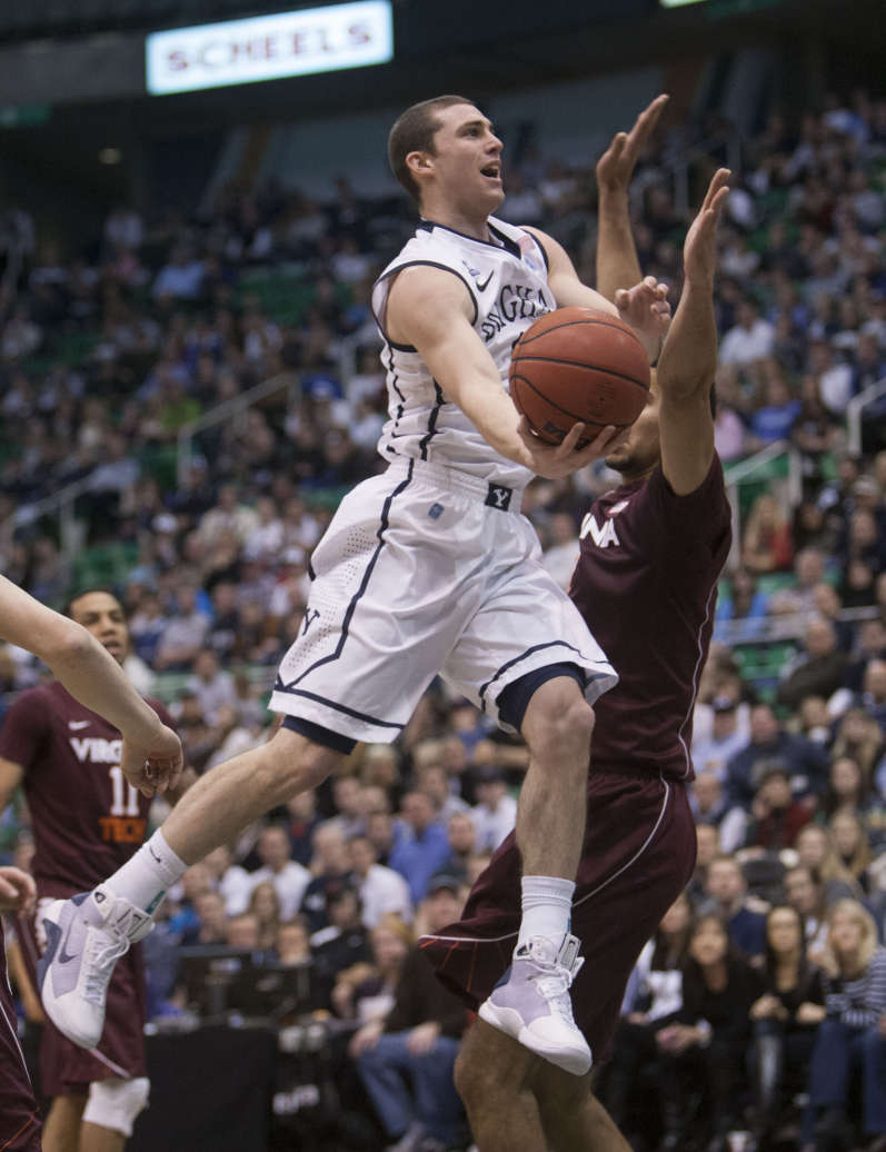 BYU's Matt Carlino puts up a shot as BYU and Virginia Tech play Saturday, Dec. 29, 2012 at Energy Solutions arena. BYU won 97-71. (Scott G Winterton, Deseret News)