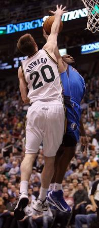 Gordon Hayward of the Utah Jazz blocks a shot by Rodrigue Beaubois of the Dallas Mavericks during NBA basketball in Salt Lake City, Monday, Jan. 7, 2013. (Ravell Call, Deseret News)