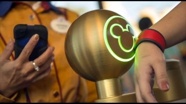 Disney: New park wristbands aren't 'Big Brother'