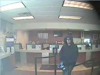 Photos released of suspected Magna bank robber