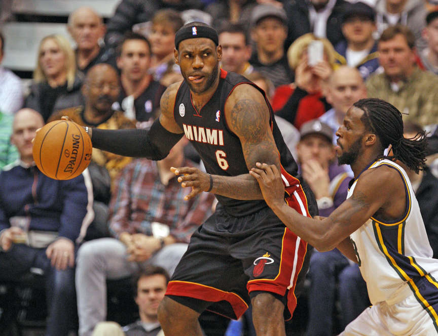 Miami Heat small forward LeBron James (6) gets ready to drive on Utah Jazz small forward DeMarre Carroll (3) (Tom Smart, Deseret News)