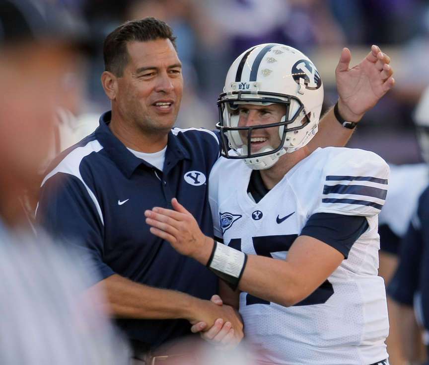 QB Max Hall with coach Robert Anae (Scott G. Winterton, Deseret News)