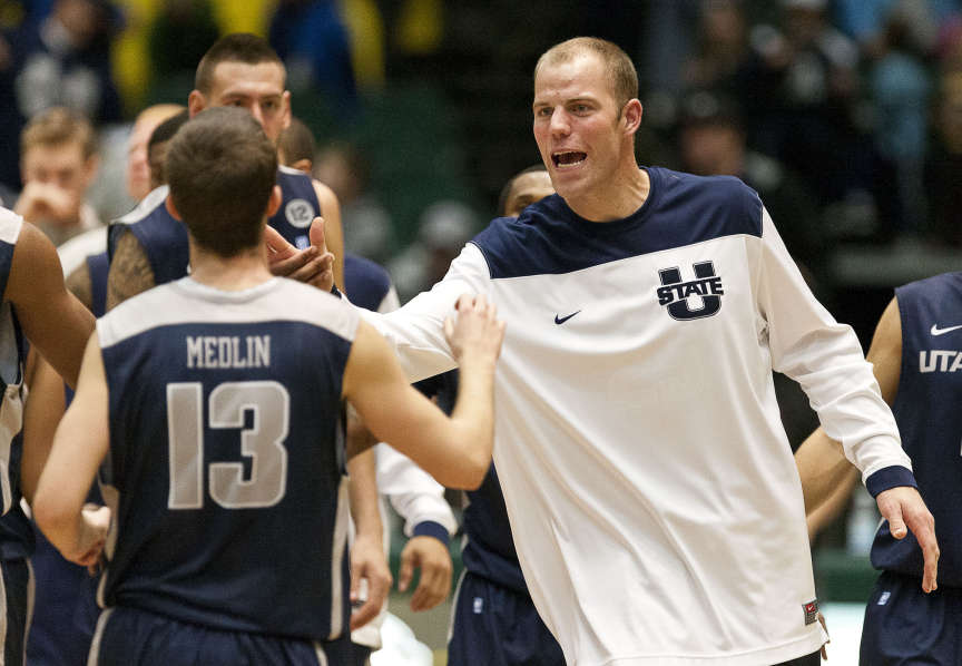 Olson scores 18, Denver downs Utah State 68-57