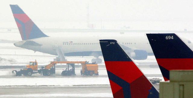 Parents of man who died after climbing into plane's engine sue Salt Lake City