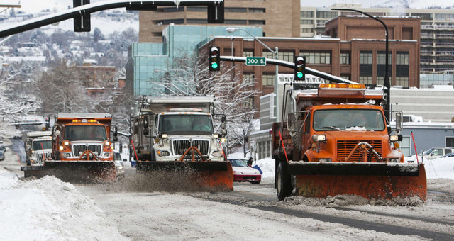 Snowplows work Monday, Jan. 28, 2013, to clear streets in Salt Lake City following a snowstorm. A new data analysis suggests some of us are less likely to have a white Christmas.