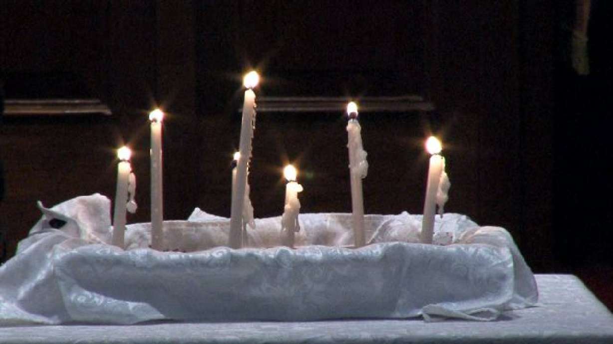 Group gathers to remember Utah downwinders at vigil