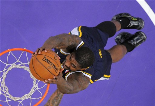 Utah Jazz forward Marvin Williams dunks during the first half of the Jazz's NBA basketball game against the Los Angeles Lakers, Friday, Jan. 25, 2013, in Los Angeles. (AP Photo/Mark J. Terrill)