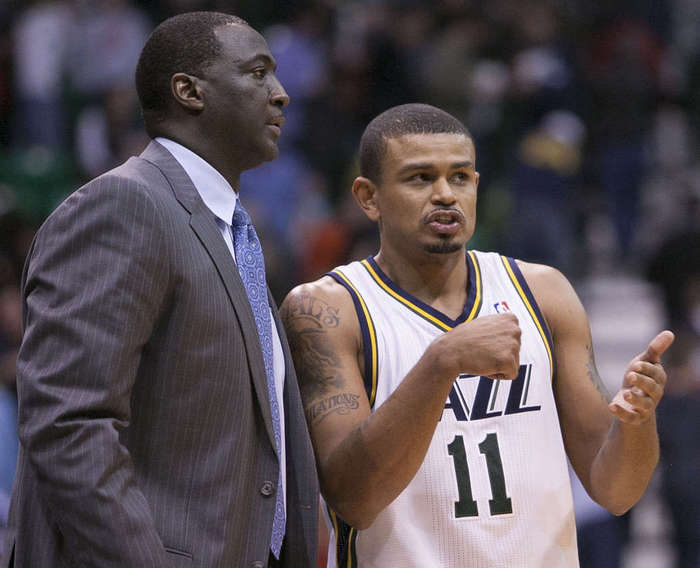 Utah Head Coach Tyrone Corbin and Earl Watson talk during a game versus the New Orleans Hornets. (Scott G. Winterton/Deseret News)