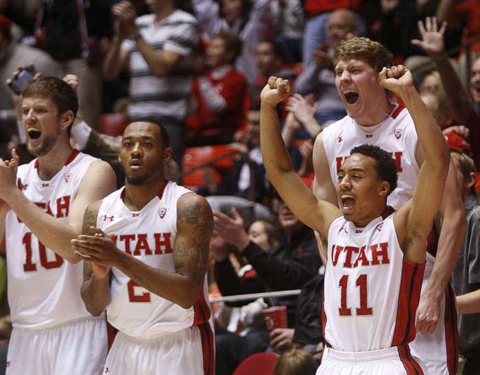 Utah's Bench erupts in cheers after a tip in shot by teammate Jordan Loveridge against SMU. (Scott G. Winterton/Deseret News)