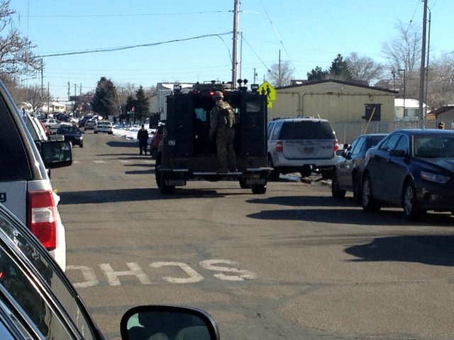 SWAT standoff causes nearby school lockdown