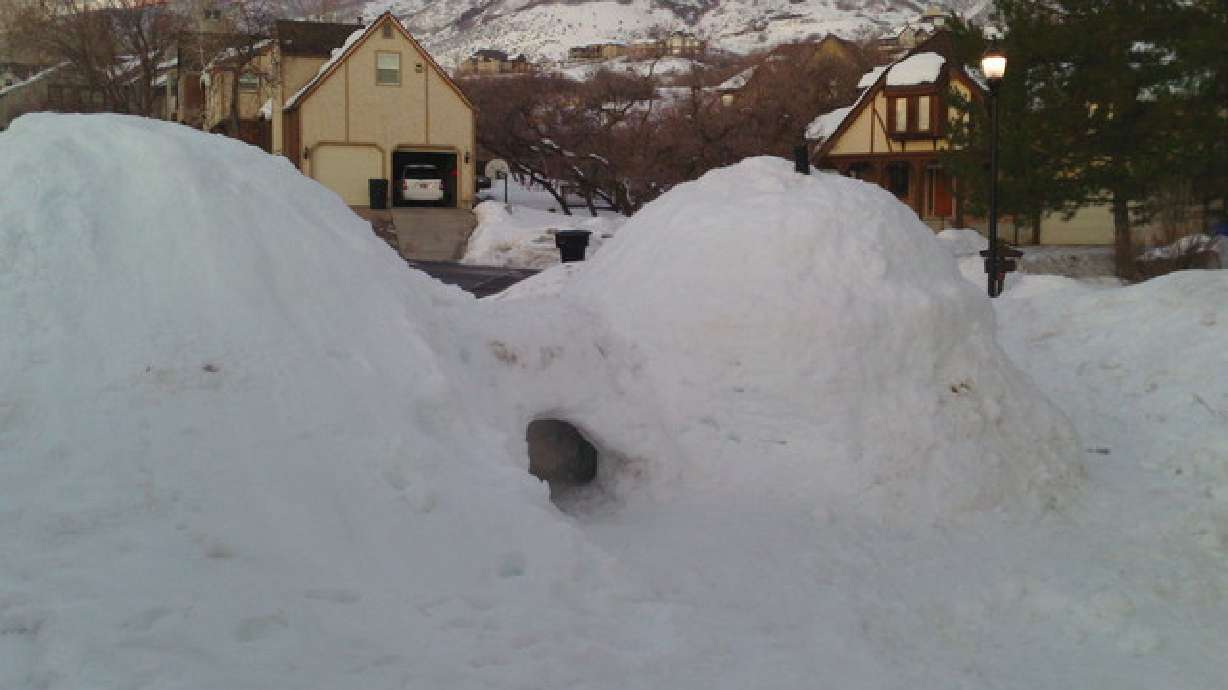 Working together, boys build 9-foot tall igloo