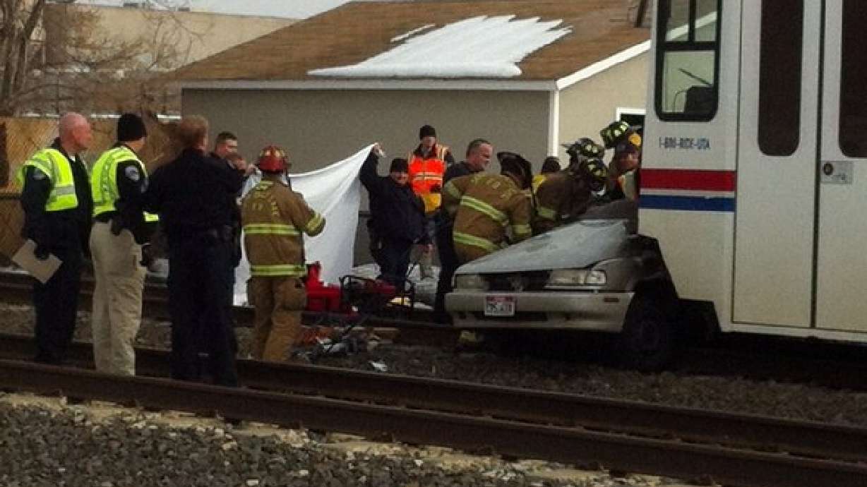 Man dies following TRAX, car crash