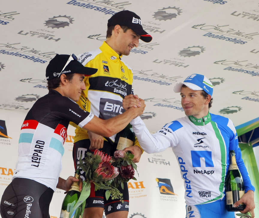 Overall winners Johann Tschopp, center, Leopold Koenig, right, and Matthew Busche, left, celebrate after the Tour of Utah Sunday, Aug. 12, 2012 Park City to Park City